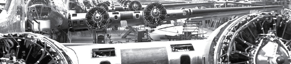 Historical image of airplanes in a factory